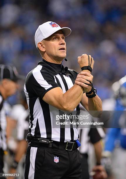 Official Clete Blakeman makes a holding call during the game between the Oakland Raiders and the Detroit Lions at Ford Field on November 22, 2015 in...