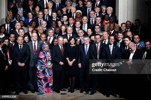 Former Mayor of New York City, Michael Bloomberg and Mayor of Paris, Anne Hidalgo pose with thousand mayors from different cities at the Paris city...