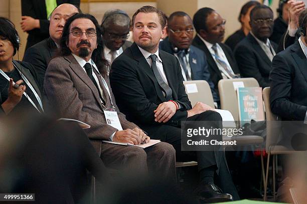Actor Leonardo DiCaprio and his father George DiCaprio attend a Summit of Local elected for Climate at the Paris city hall on December 04, 2015 in...