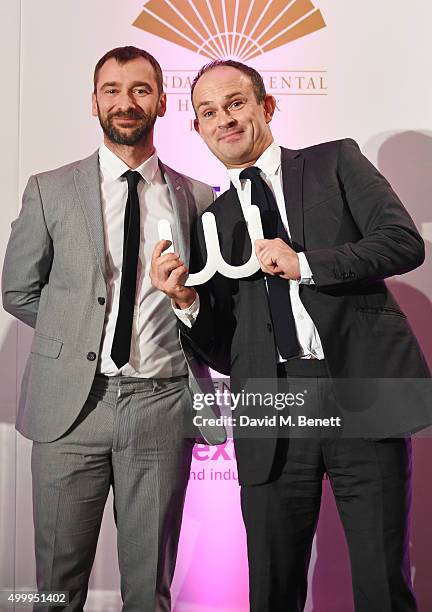 Charlie Condou and Stuart Murphy, winner of the Winq Media Award, attend the Winq Magazine Men of the Year lunch to benefit the Elton John Aids...