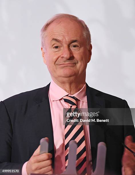 Paul Gambaccini speaks onstage at the Winq Magazine Men of the Year lunch to benefit the Elton John Aids Foundation at The Mandarin Oriental Hyde...