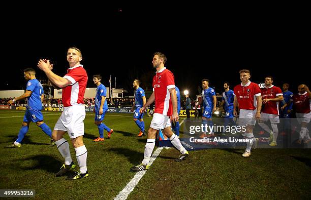 The teams make their way out onto the pitch prior for the Emirates FA Cup Second Round match between Salford City and Hartlepool United at Moor Lane...