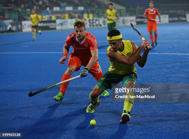 Jamie Dwyer of Australia controls the ball during the match between Australia and Netherlands on day eight of The Hero Hockey League World Final at...