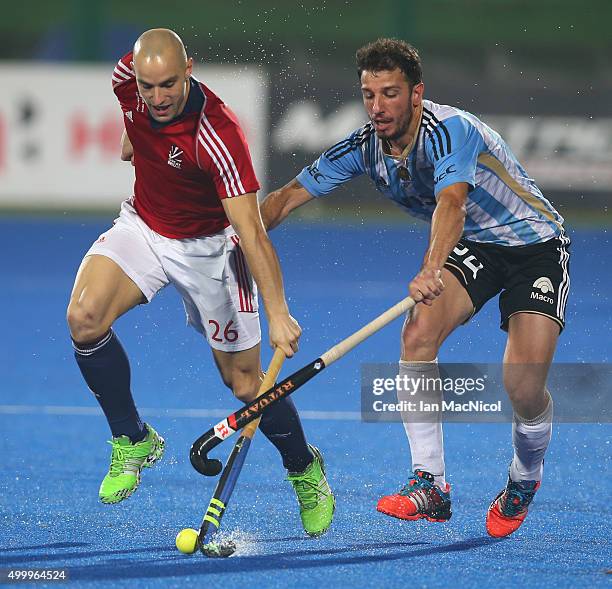 Nick Catlin of Great Britain vies with Manuel Brunet of Argentina during the match between Great Britain and Argentina on day eight of The Hero...