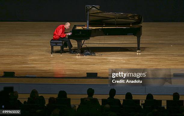 Pianist David Helfgott performs during a concert at Ankara Chamber of Commerce Congressium hall in capital Ankara, Turkey on December 4, 2015.