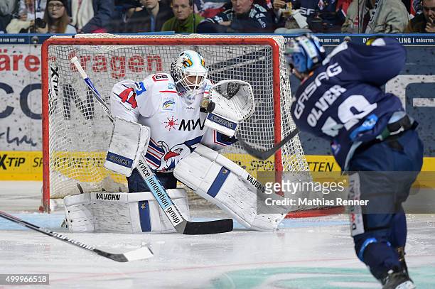 Dennis Endras of the Adler Mannheim in action during the game between the Eisbaeren Berlin and Adler Mannheim on december 4, 2015 in Berlin, Germany.