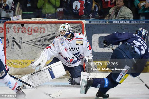 Dennis Endras of the Adler Mannheim in action during the game between the Eisbaeren Berlin and Adler Mannheim on december 4, 2015 in Berlin, Germany.