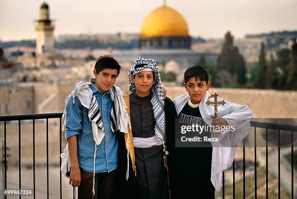 Jerusalem, Israel. Reza brought together three children, one Jewish, one Muslim and one Christian, all bearing the name of Abraham, at the Dome of...