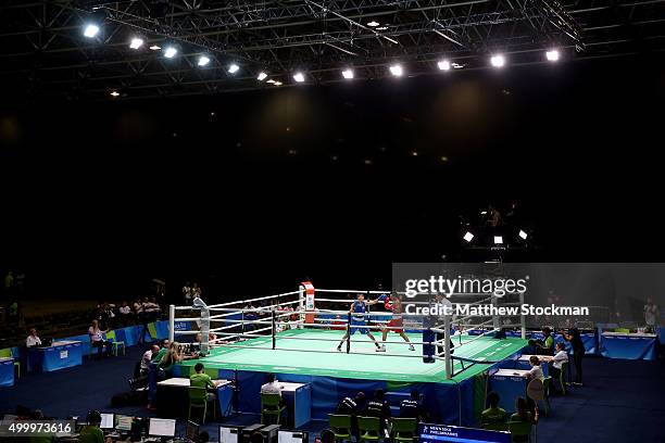 Hamza Touba of Germany fights Juliano De Miranda Henriques Neto of Brazil in the Men's Fly class during the International Boxing Tournament - Aquece...