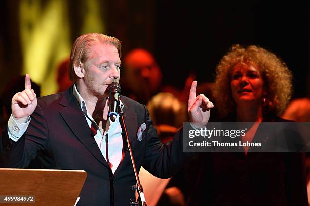 Ben Becker and Nina Hoger react at the end of the anniversary concert Rilke Projekt Live 'Dir zur Feier' at Alte Oper on December 4, 2015 in...