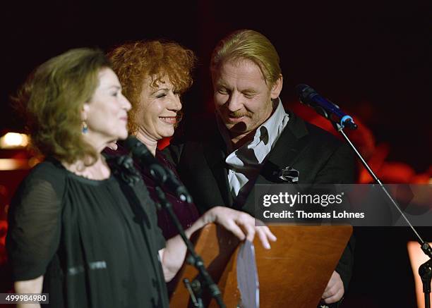 Hannelore Elsner, Nina Hoger and Ben Becker react at the end of the anniversary concert Rilke Projekt Live 'Dir zur Feier' at Alte Oper on December...