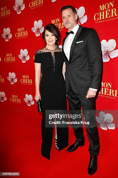 Iris Berben and Heiko Kiesow attend the Mon Cheri Barbara Tag 2015 at Postpalast on December 4, 2015 in Munich, Germany.