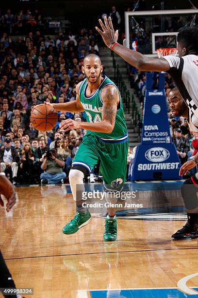 Devin Harris of the Dallas Mavericks drives against the Houston Rockets on December 4, 2015 at the American Airlines Center in Dallas, Texas. NOTE TO...