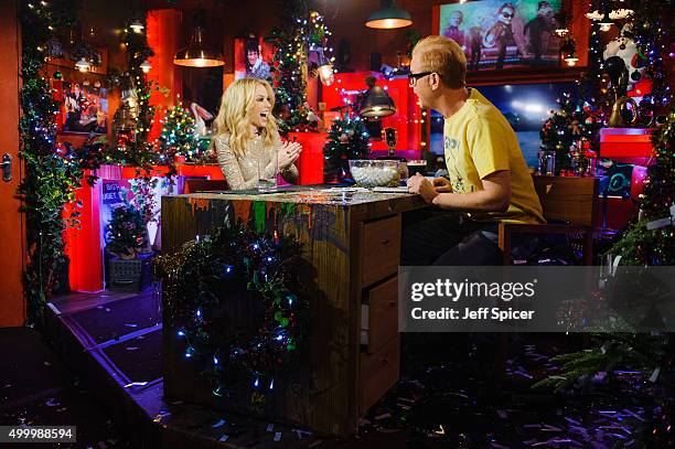 Kylie Minogue and Chris Evans during a live broadcast of "TFI Friday" on December 4, 2015 in London, England.