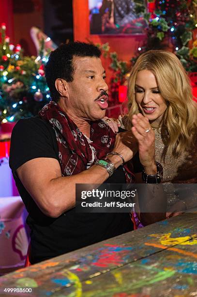 Lionel Richie and Kylie Minogue during a live broadcast of "TFI Friday" on December 4, 2015 in London, England.