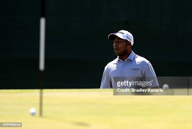 Harold Varner of the USA reacts after his ball narrowly misses the hole on the 18th hole during day three of the 2015 Australian PGA Championship at...