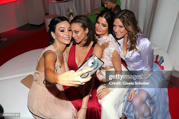 Verona Pooth, Lilly Becker, Shermine Shahrivar and Simone Ballack making a selfie during the Mon Cheri Barbara Tag 2015 at Postpalast on December 4,...