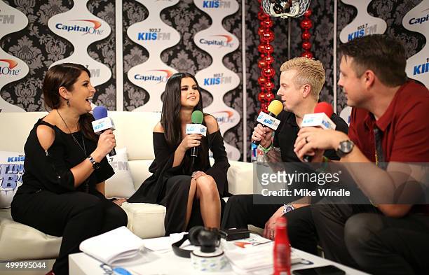 Radio personality Sisanie, singer/actress Selena Gomez, radio personalities JoJo Wright and Jesse Lozano attend 102.7 KIIS FMs Jingle Ball 2015...