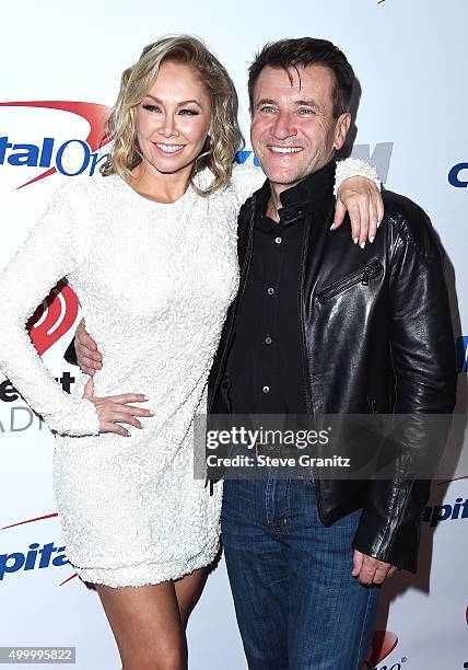 Dancer/TV personality Kym Johnson and businessman/TV personality Robert Herjavec attend 102.7 KIIS FMs Jingle Ball 2015 Presented by Capital One at...