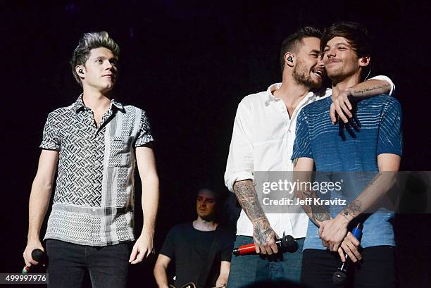 Recording artists Niall Horan, Liam Payne and Louis Tomlinson of One Direction performs onstage during 102.7 KIIS FMs Jingle Ball 2015 Presented by...