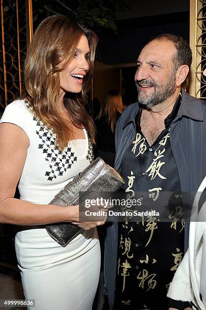 Cindy Crawford and producer Joel Silver attend a book party in honor of "Becoming" by Cindy Crawford, hosted by Bill Guthy And Greg Renker, at Eric...