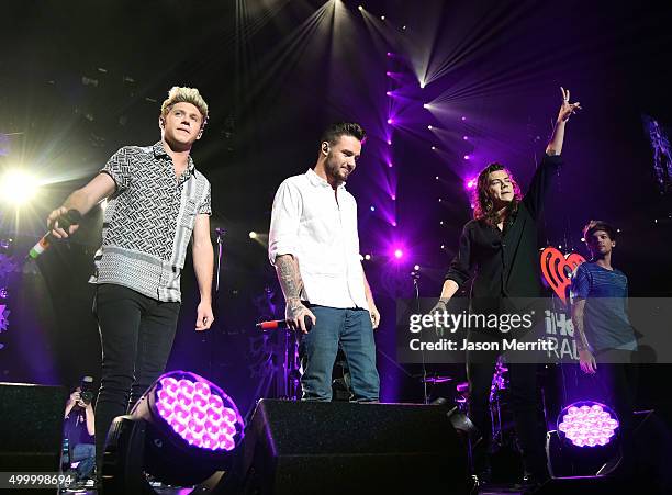 Singers Niall Horan, Liam Payne, Harry Styles and Louis Tomlinson of One Direction perform onstage during 102.7 KIIS FM�s Jingle Ball 2015 Presented...