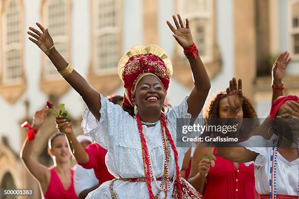 brazil baianas celebrating saint barbara in salvador da bahia - macumba stock pictures, royalty-free photos & images