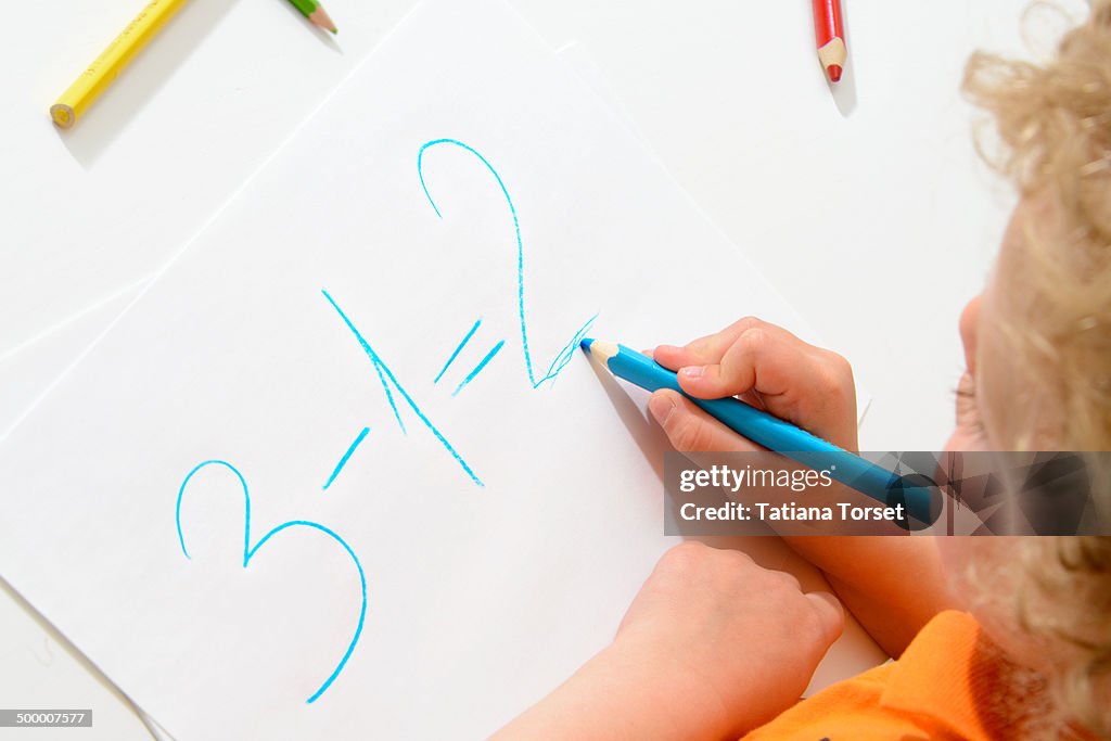 Child Write Number Child Writing Numbers High-Res Stock Photo - Getty Images