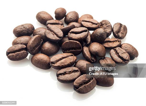 coffee beans on white - coffee beans stock pictures, royalty-free photos & images
