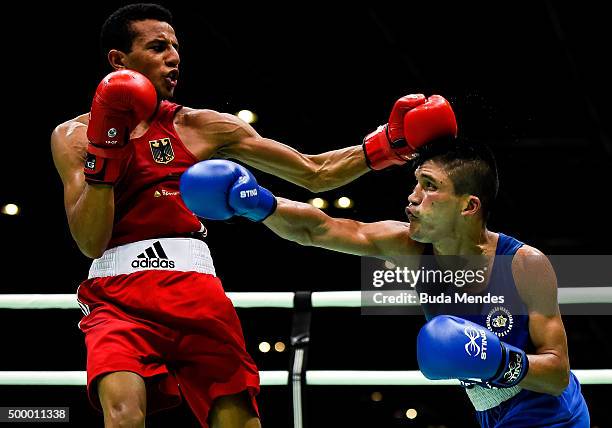Hamza Touba of Germany fights Juliao de Miranda of Brazil in the Men's Fly class during the International Boxing Tournament - Aquece Rio Test Event...