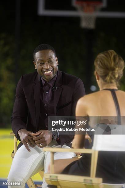 Dwyane Wade shares a laugh with Bloomberg's Stephanie Ruhle before Hublot & Haute Living Toast Art Basel with Private Dinner hosted by Dwyane Wade &...