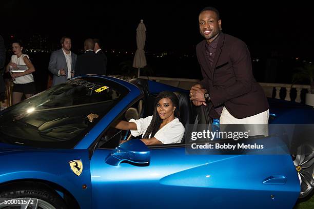 Gabrielle Union and Dwyane Wade pose during the Hublot & Haute Living Toast Art Basel with Private Dinner hosted by Dwyane Wade & Gabrielle Union on...