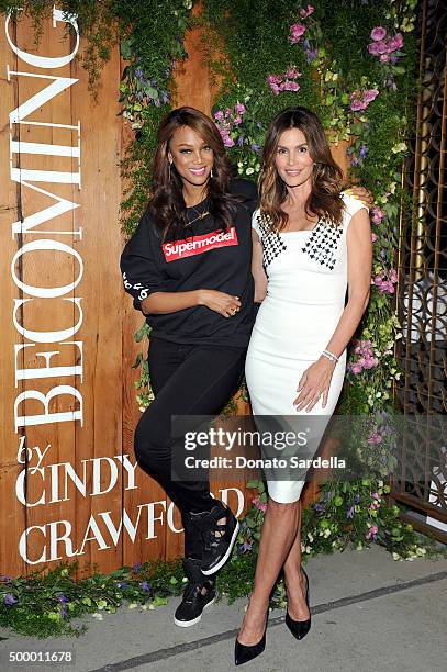 Tyra Banks and Cindy Crawford attend a book party in honor of "Becoming" by Cindy Crawford, hosted by Bill Guthy And Greg Renker, at Eric Buterbaugh...