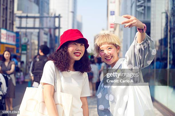 tokyo women - blonde woman selfie foto e immagini stock