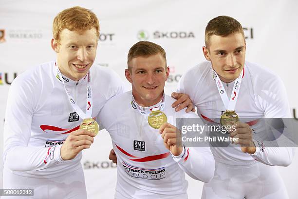 Joachim Eilers, Max Niederlag and Rene Enders of Germany celebrate with their gold medals after winning the Mens Team Sprint final during the 2015...