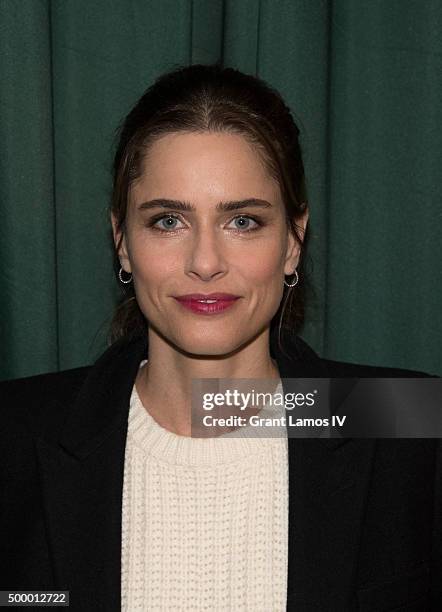 Amanda Peet promotes her book 'Dear Santa, Love, Rachel Rosenstein' at Barnes & Noble 82nd Street on December 4, 2015 in New York City.