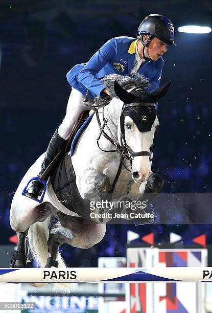 Christian Ahlmann of Germany competes in the Longines Speed Challenge show jumping event on day two of the Longines Paris Masters 2015 held at the...