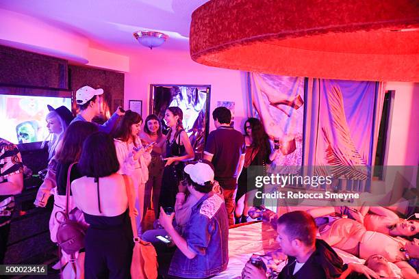 Guests attend 'Motelscape,' an interactive fantasy performance and installation presented by Marina Fini, Signe Pierce, Sierra Grace and Sydney...