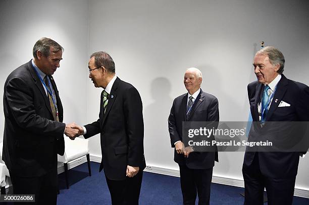 Senator of Oregon Jeff Merkley and UN Secretary-General Ban Ki-moon greet each other while Senators Ben Cardin and Ed Markey wait prior a Press...