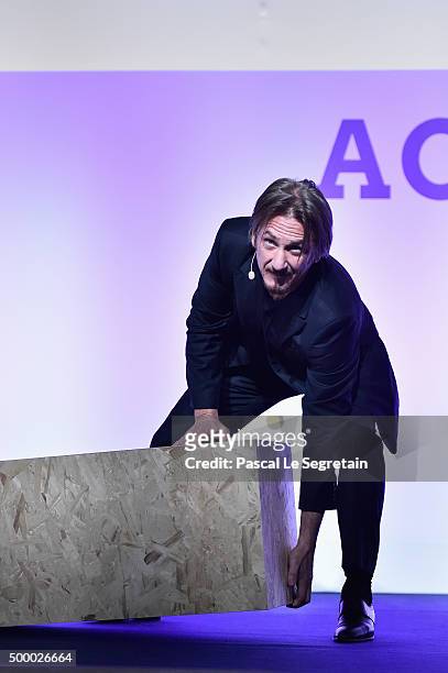Actor Sean Penn makes a speech for the Action Day during the 21st Session Of Conference On Climate Change on December 5, 2015 in Paris, France. He is...