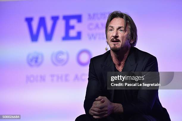 Actor Sean Penn makes a speech for the Action Day during the 21st Session Of Conference On Climate Change on December 5, 2015 in Paris, France. He is...
