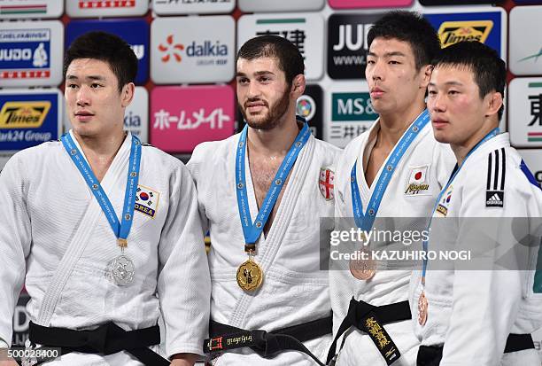 Gold medalist Georgia's Avtandili Tchrikishvili , silver medalist South Korea's Lee Seungsu and bronze medalists Japan's Takanori Nagase , South...