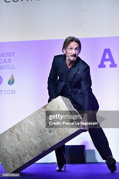 Actor Sean Penn makes a speech for the Action Day during the 21st Session Of Conference On Climate Change on December 5, 2015 in Paris, France. He is...