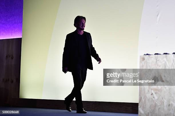 Actor Sean Penn arrives on stage for the Action Day during the 21st Session Of Conference On Climate Change on December 5, 2015 in Paris, France. He...