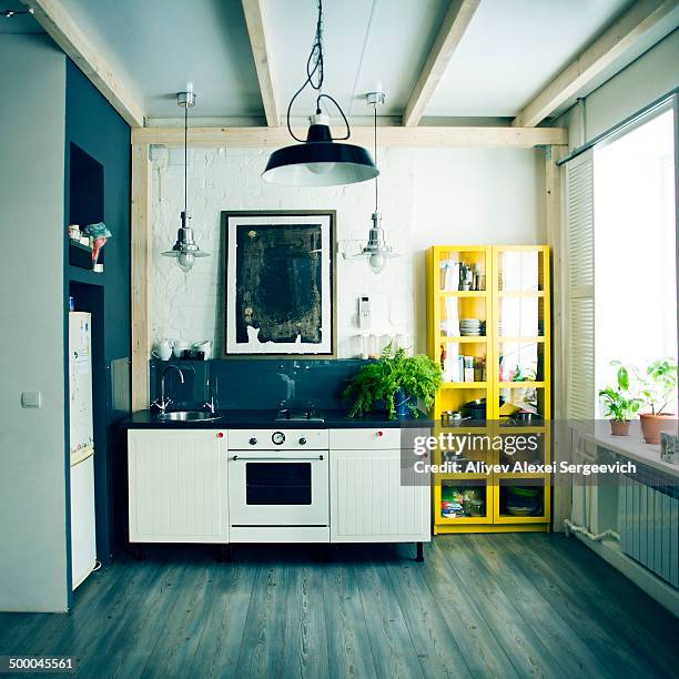 sink, oven and shelves in apartment kitchen - small apartment stock pictures, royalty-free photos & images