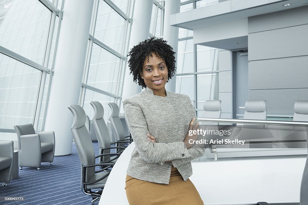 Black businesswoman standing in conference room