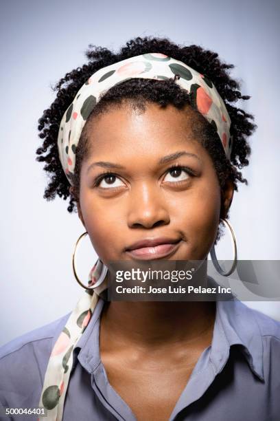 mixed race woman thinking - angry black woman stock pictures, royalty-free photos & images