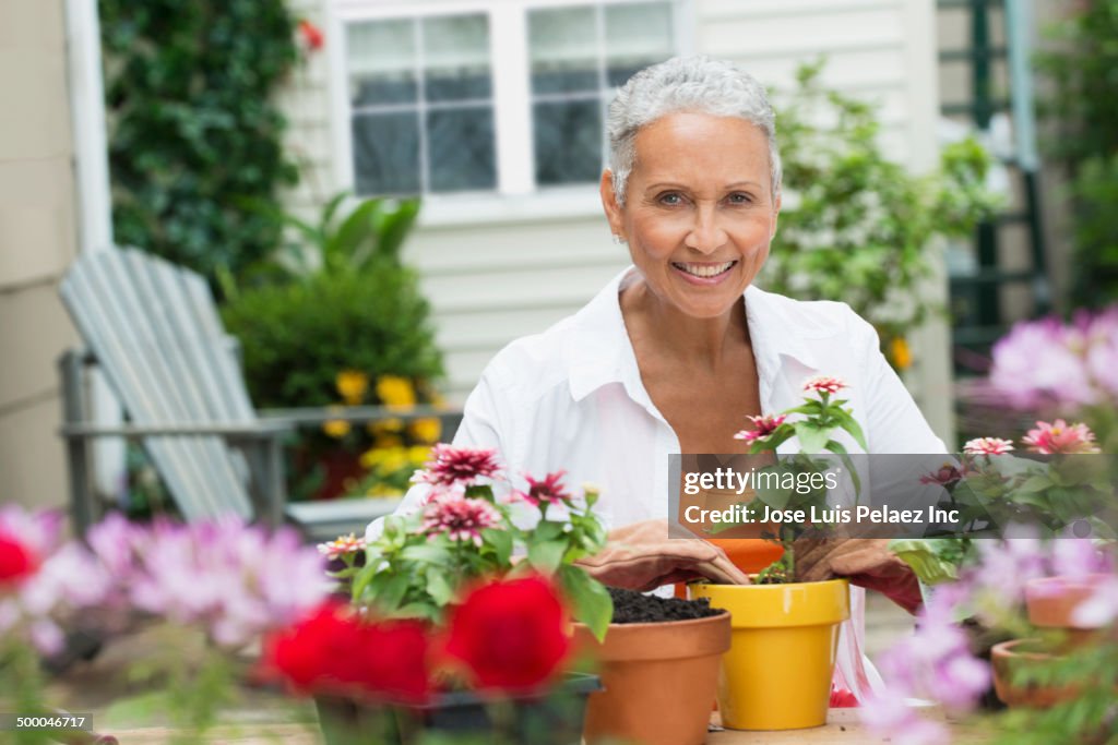 Senior African American woman gardening