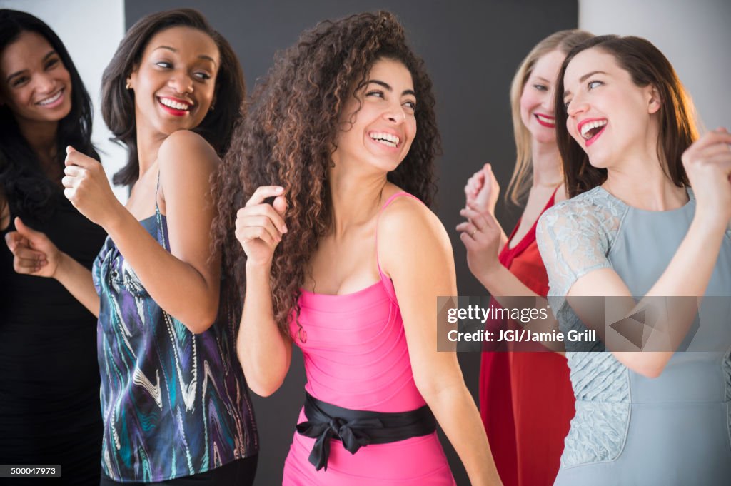 Women dancing together