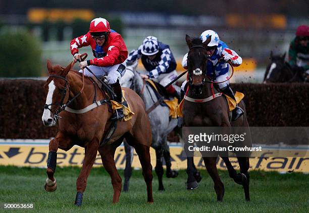 Jamie Moore riding Sire De Grugy clear the last to win The Betfair Tingle Creek Steeple Chase from Special Tiara at Sandown racecourse on December...